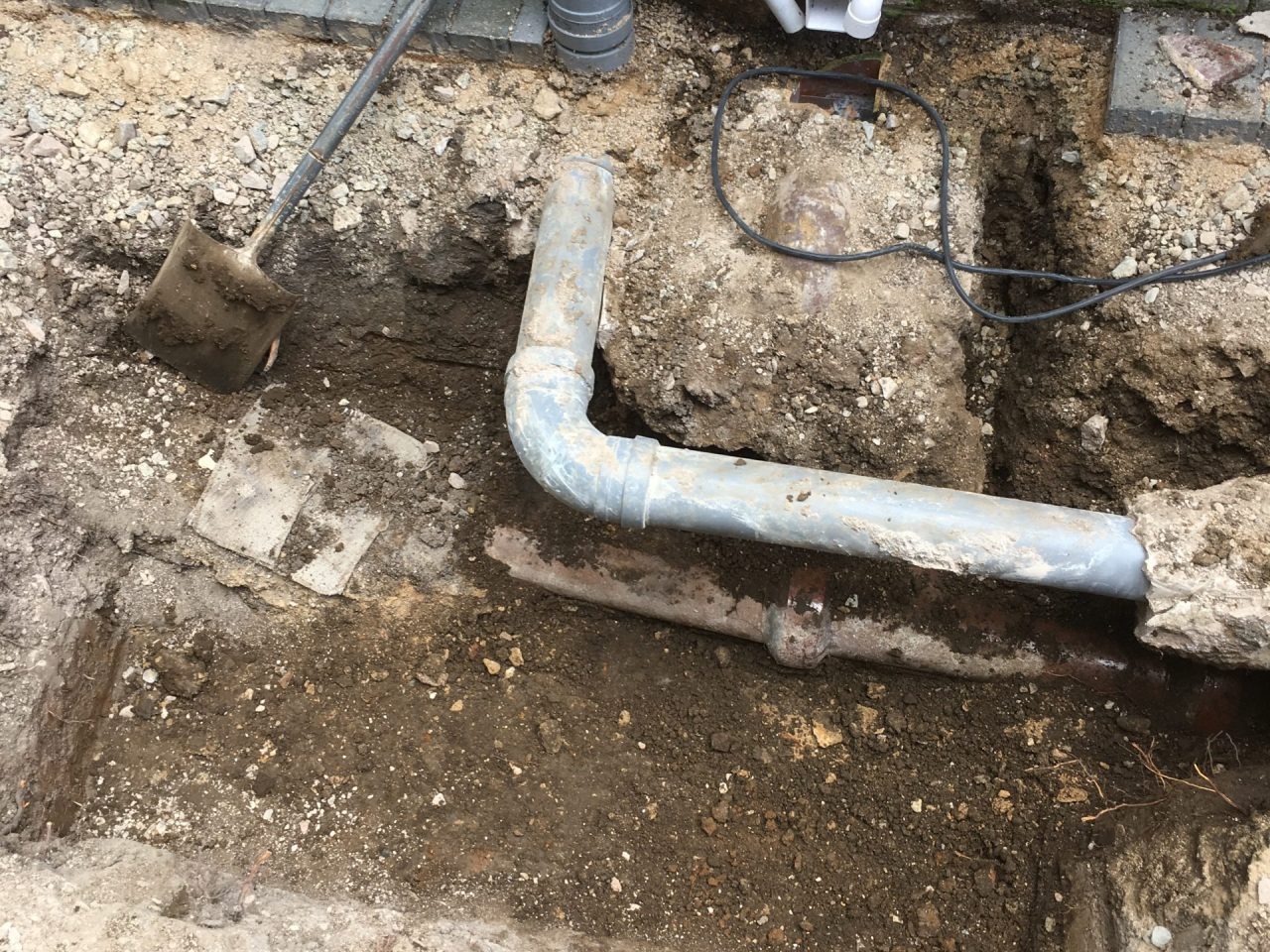 Old cracked soil pipe in need of replacement